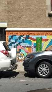Image of a colorful mural on the side of a building